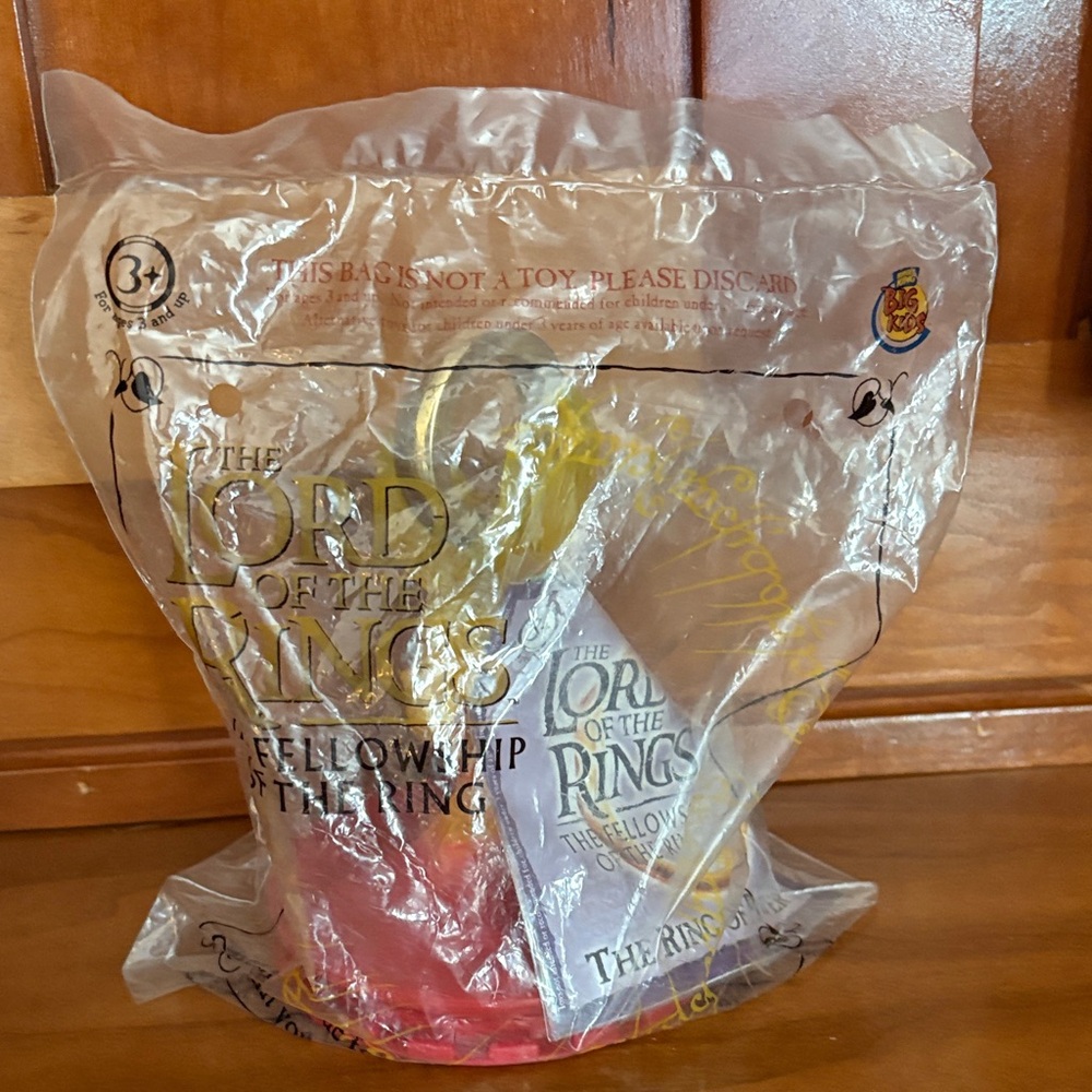 The Lord of the Rings Fellowship of the Ring Kids Action Figure - Yellow & Red